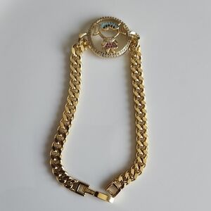 Elegant 14K gold plated Cuban link bracelet featuring a unique colorful Girl
